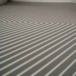 Fine lines painted on a wall with a wall stencil
