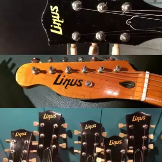 Various guitar headstocks painted with the Linus logo.