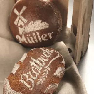  Two different flour motifs on fresh bread - Order baking stencils online