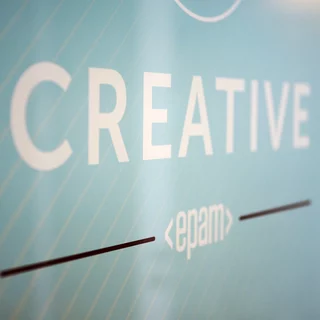 Close-up of an acrylic glass sign with the inscription CREATIVE
